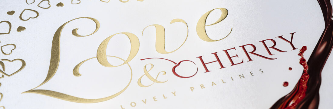 Białe opakowanie pralin Love & Cherry Lovely Pralines od Vobro